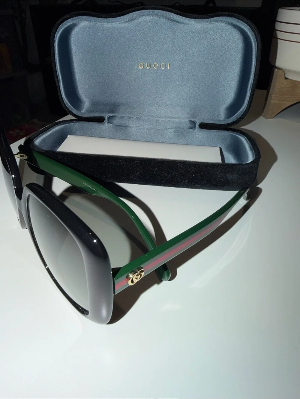 Gucci Women’s Black Frames with Green and Red Stripe Temples Sunglasses